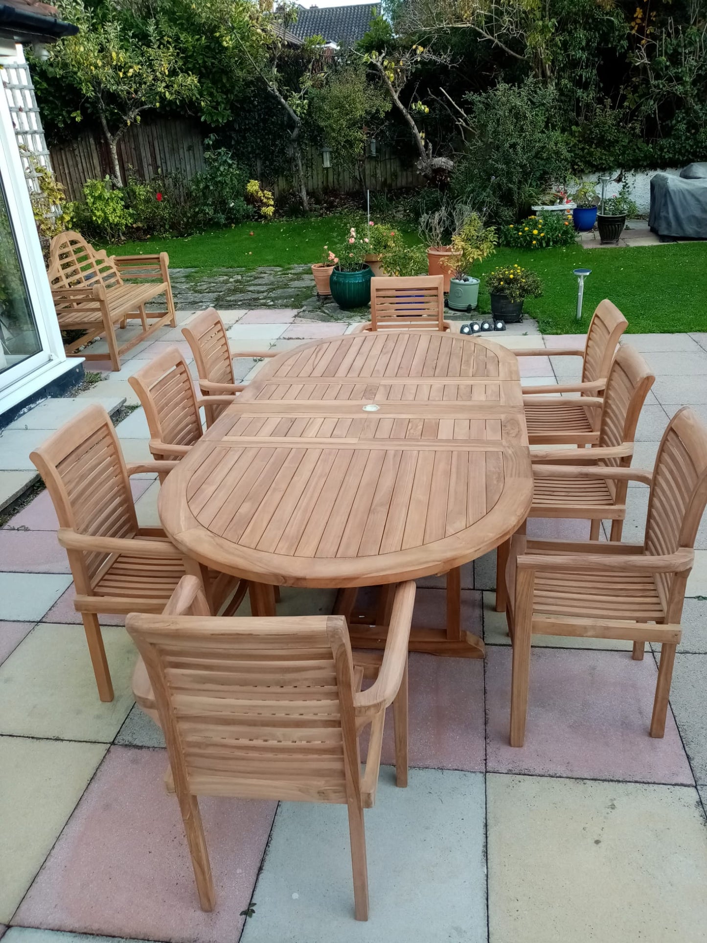 8 x Chairs with Oval Extending Table